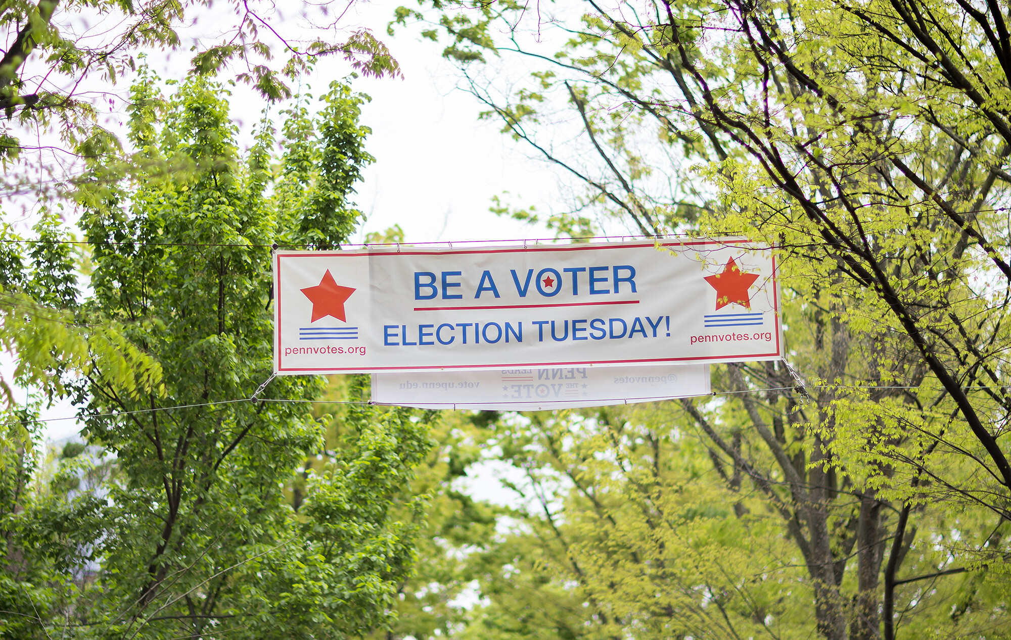 Be a Voter banner hanging on Locust Walk.