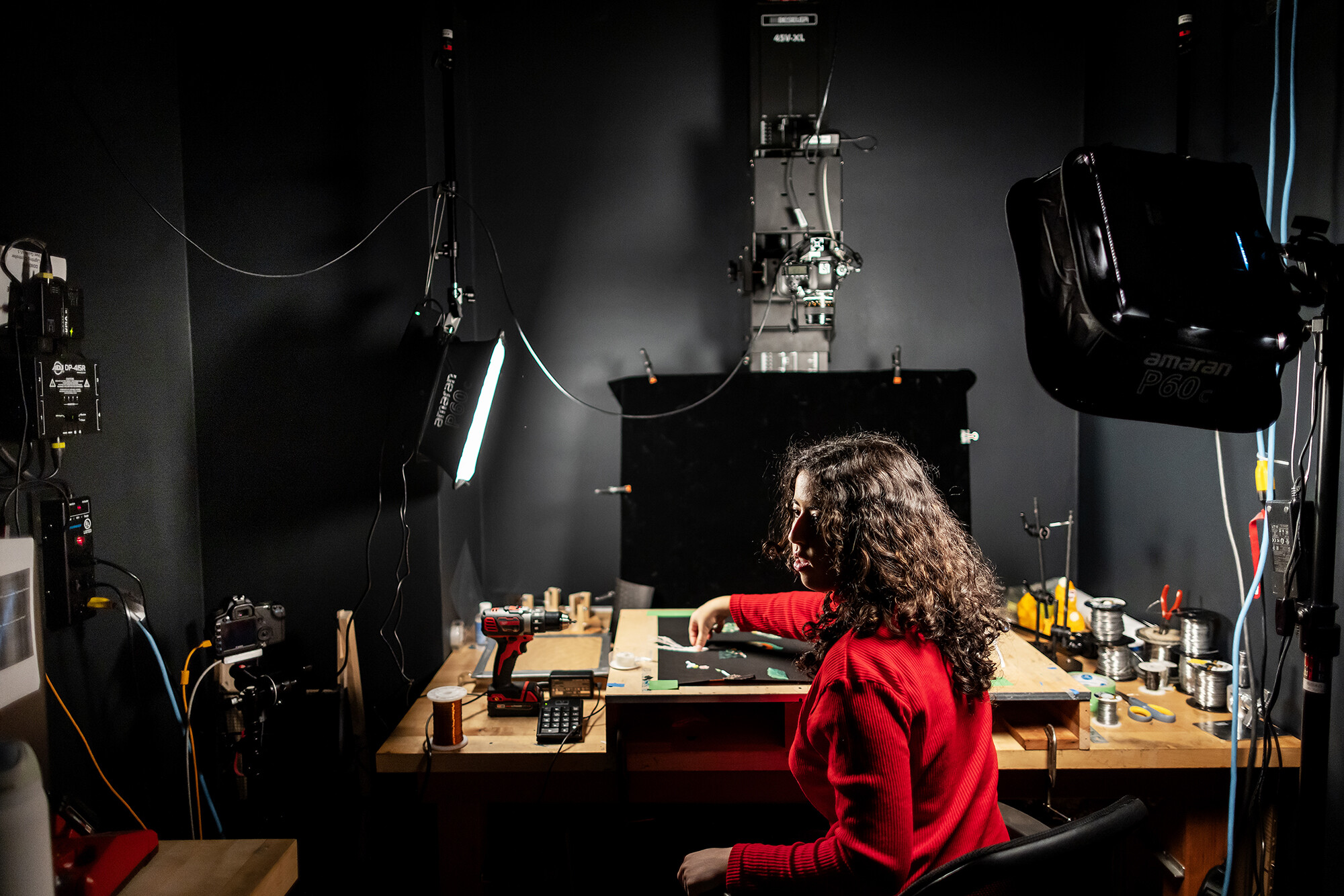photography student works with a copy stand