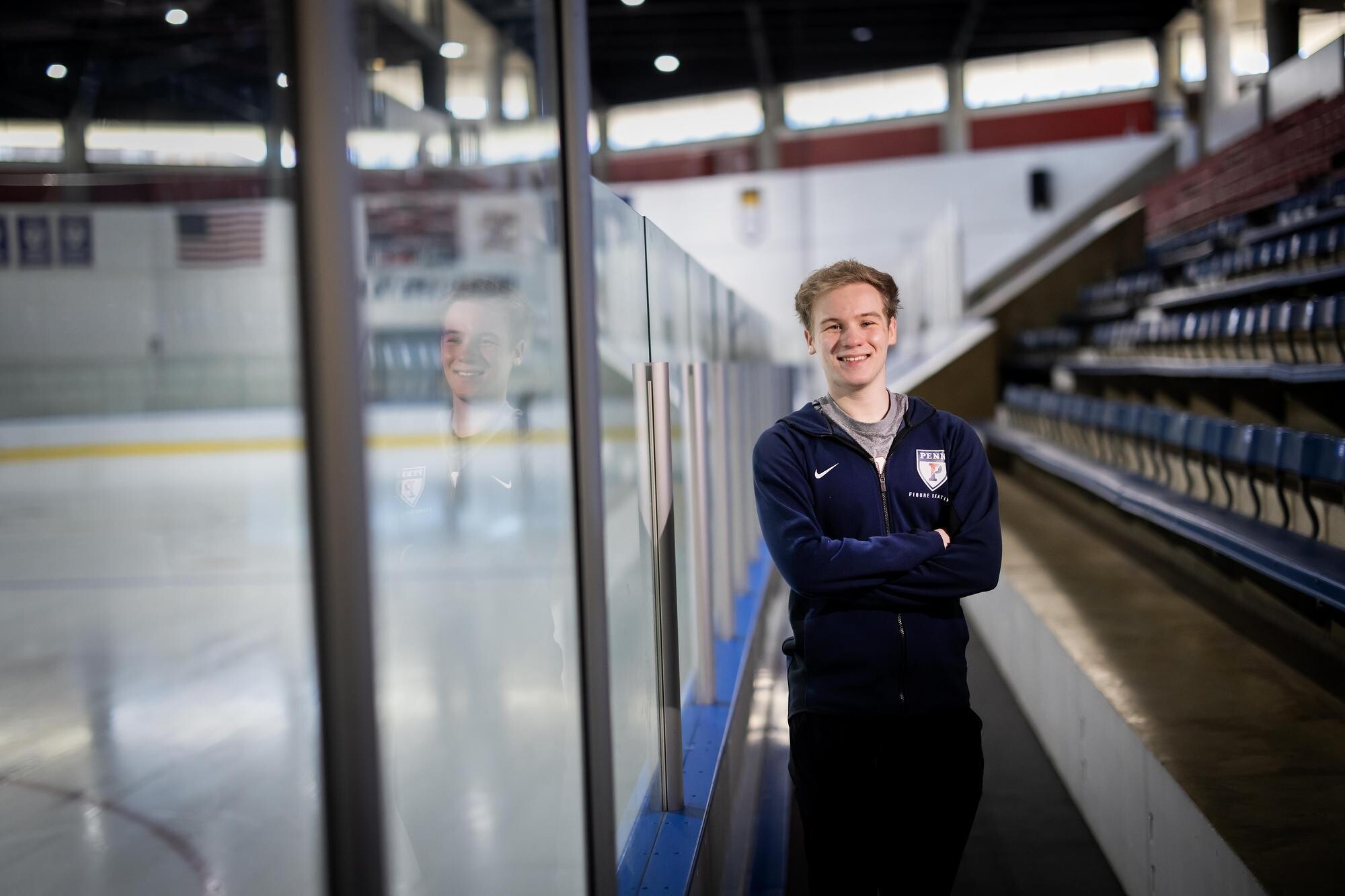 Nick Bausenwein poses next to ice rink.