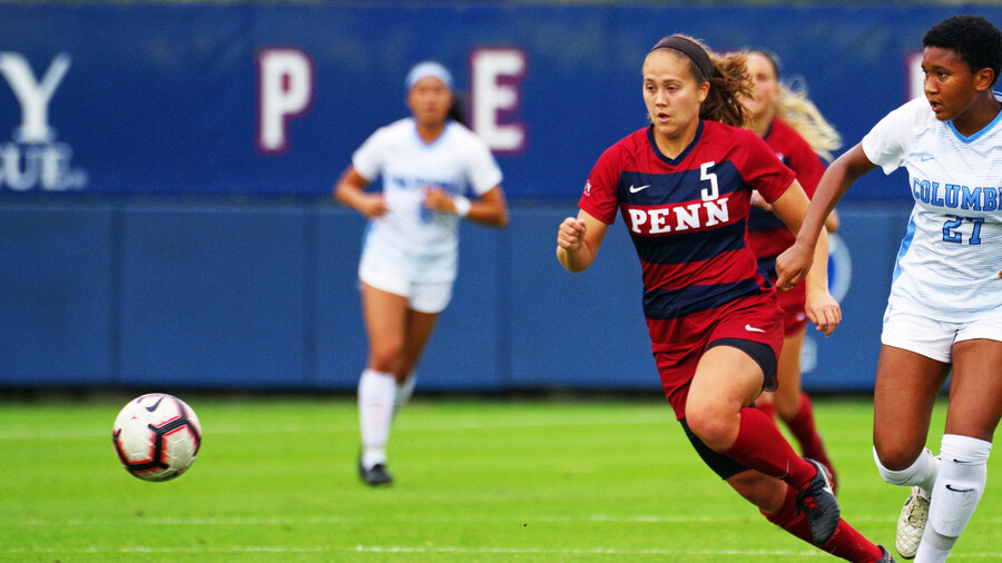 Emily Sands battles for the ball against Columbia