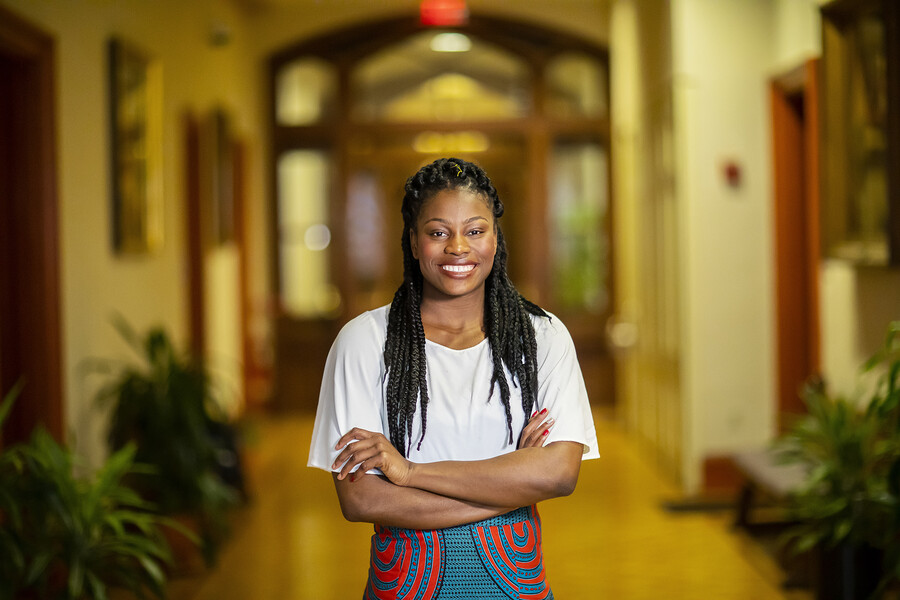 Woman standing in a hallway
