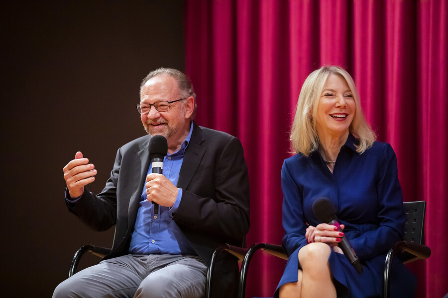 Moreno and Gutmann on stage smiling