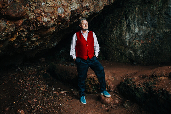 Brendan O'Leary standing with hands in pockets.