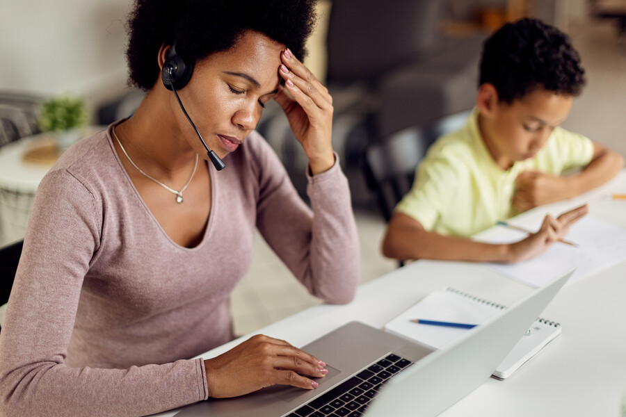 stressed mother at home with child