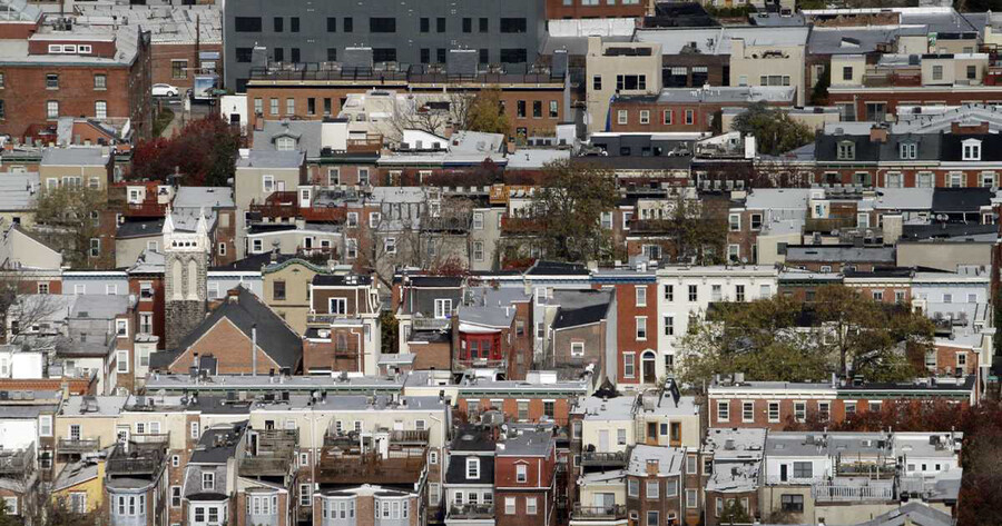 Aerial view of several blocks of rowhouses in Philadelphia.