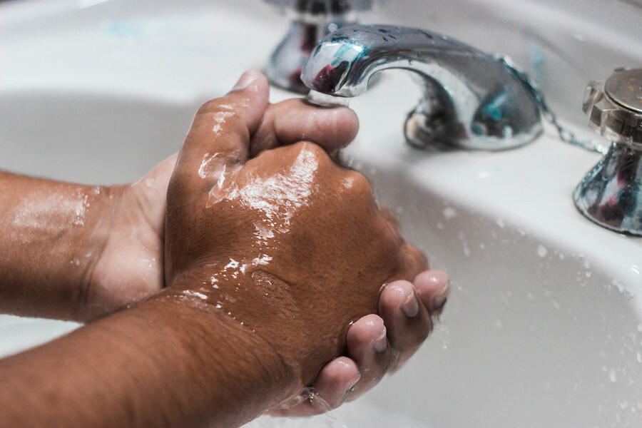 washing hands in a sink