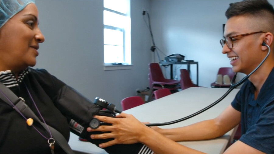 penn nursing student taking blood pressure