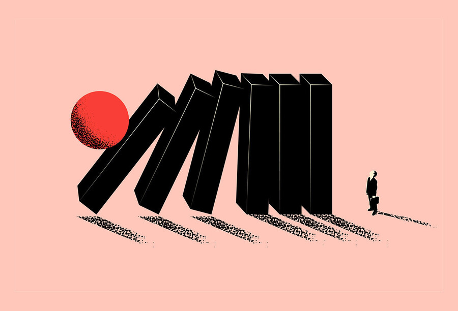 Dominoes about to fall on a tiny person holding a briefcase