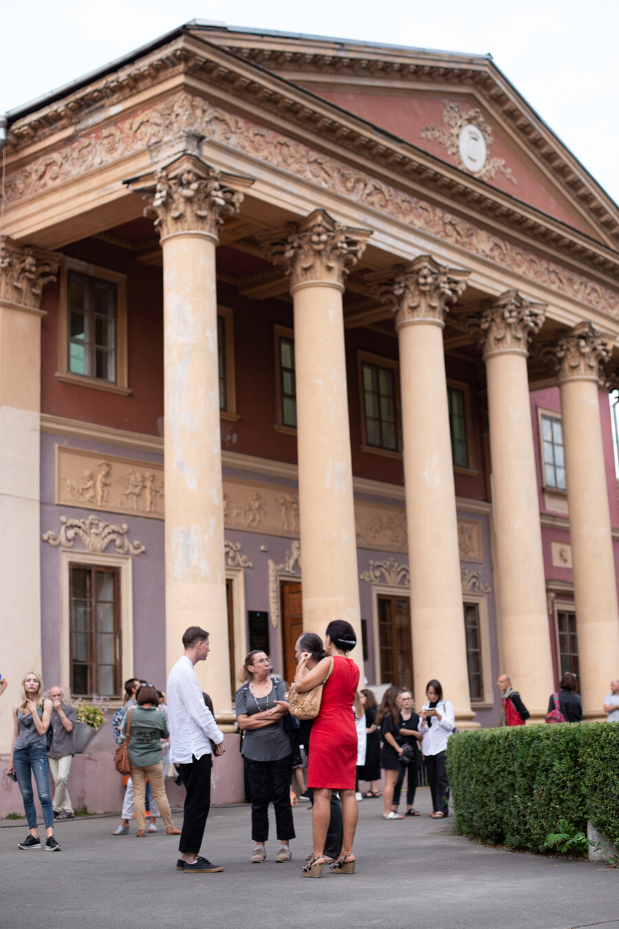Pavel Golubev speaking in front of art museum