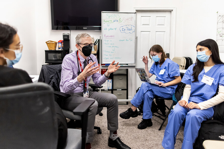 joseph teel with shelter health students