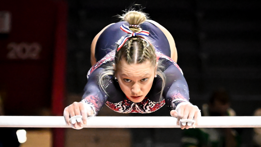 McCaleigh Marr performs on the bar