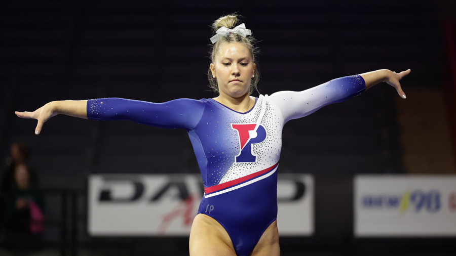 McCaleigh Marr performs on the balance beam