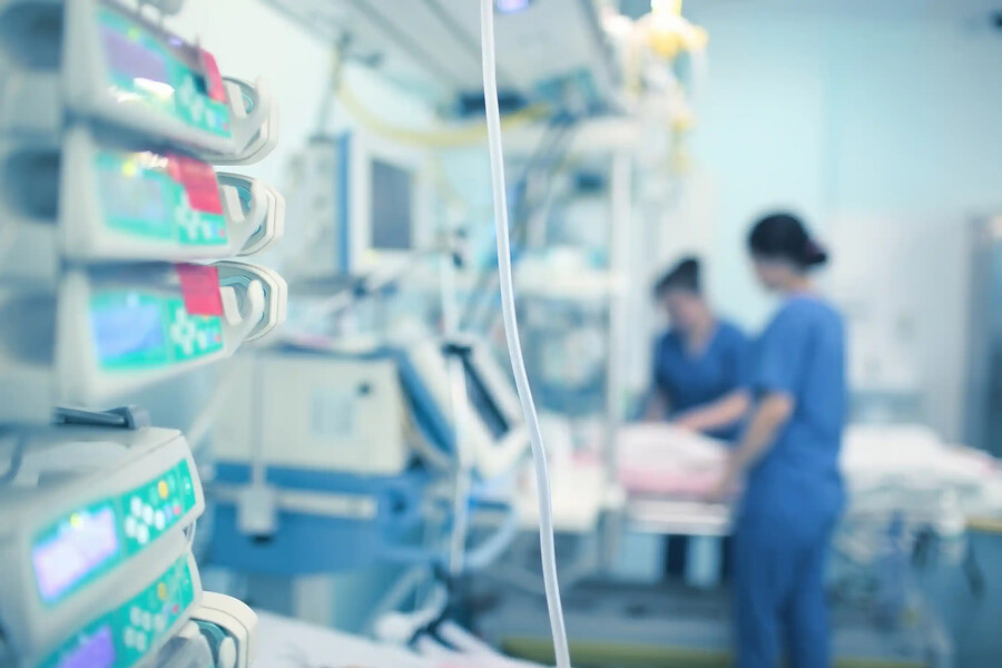 Nurses in the NICU.