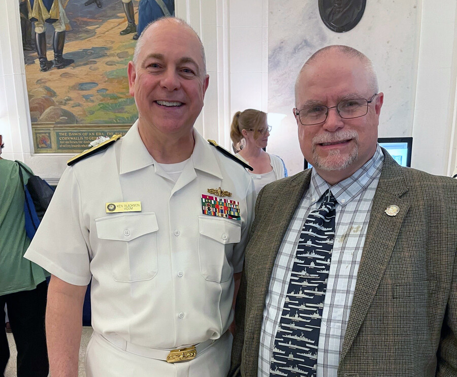 Rear Admiral Ken Blackmon, left, stands next to Joseph-James "J.J." Ahern.
