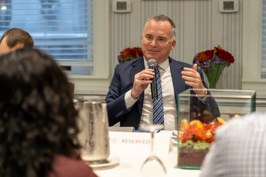 Michael Weisberg speaking into a microphone.