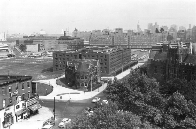   Hill College House in 1961. The building was constructed of hand-molded red brick and black steel, and surrounded by a moat and high fence.