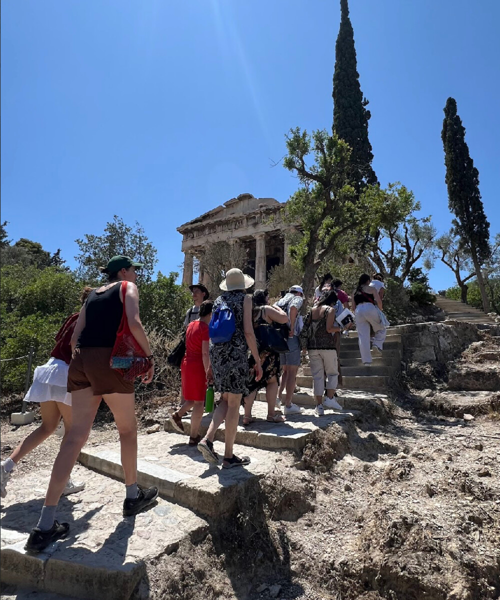 penn students climbing stairs in Athens, Greece