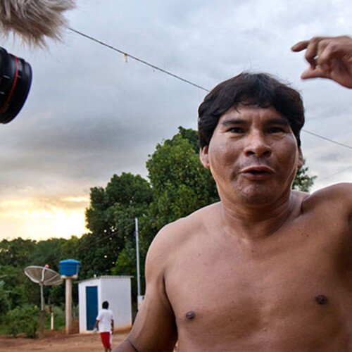 Shirtless Brazilian man being captured on film