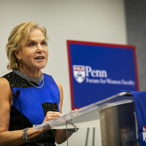 Judith Rodin dressed in blue at podium