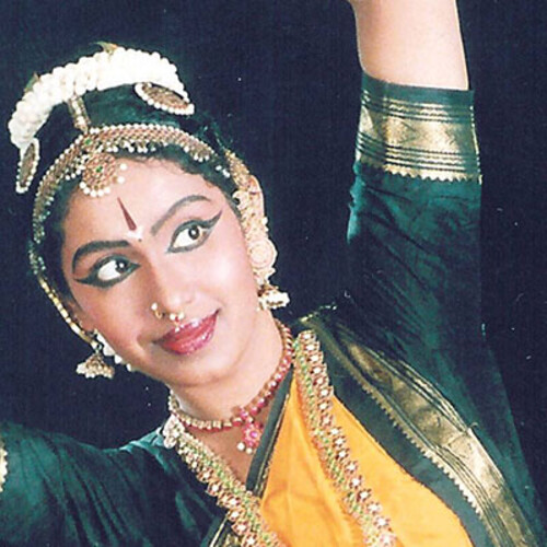 Woman in elaborate makeup and costume