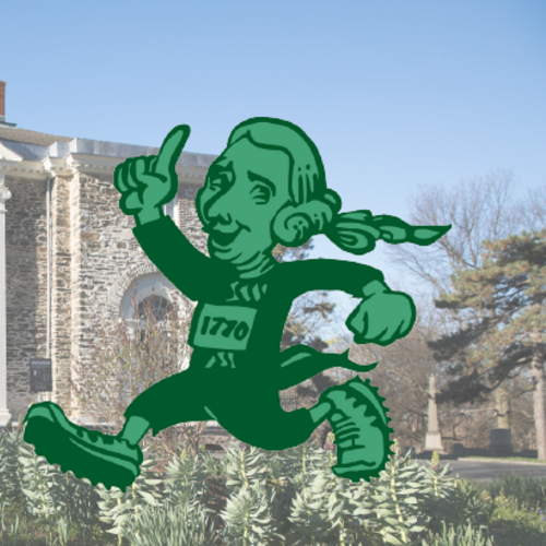 Front of Hamilton Mansion with a runner passing by