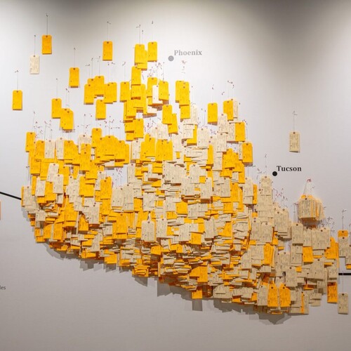 Toe tags mapped on a wall