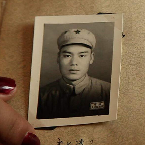 Black and white photo of person in uniform