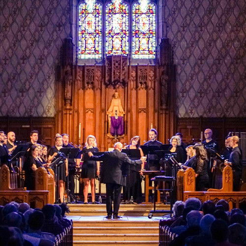 Choir performs inside a church