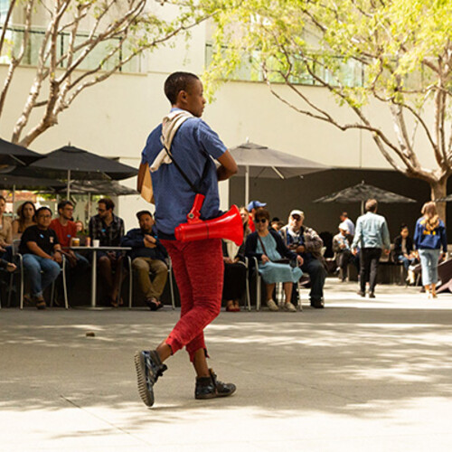 Taisha Paggett performs in public square
