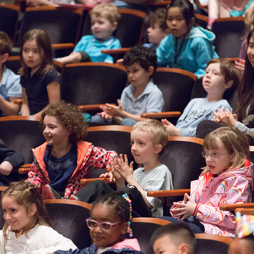 Kids seated for Children's Festival 2019