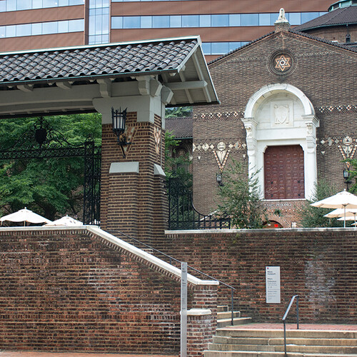 Exterior of Penn Museum in daylight.
