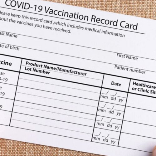 A COVID-19 vaccination record card. 
