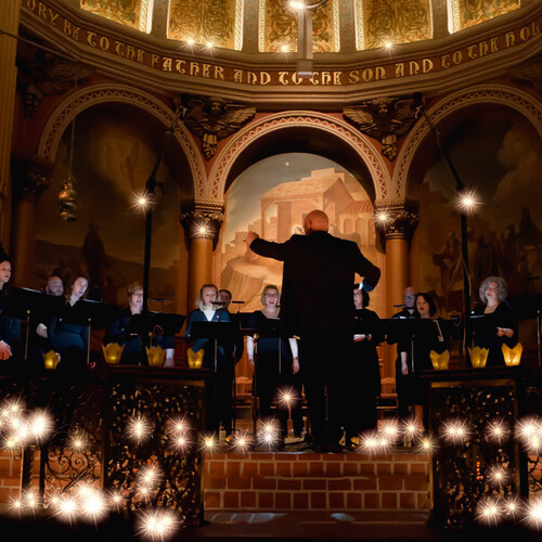 Composers performing on stage. 
