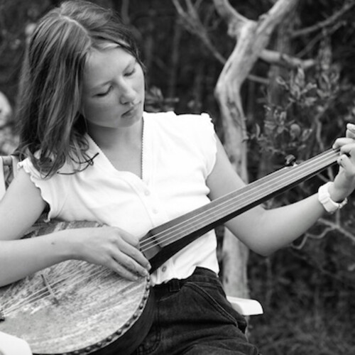 Nora Brown on the guitar.