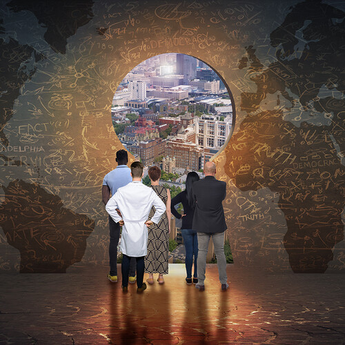 Five people look out of a hole in a wall covered in graffit at the Philadelphia cityscape.