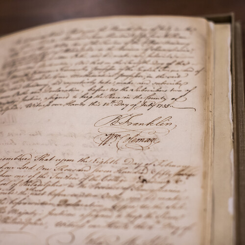 A historic book from Penn Archives with Ben Franklin’s signature.