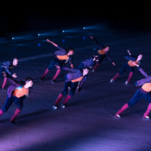 Ice skaters in motion.