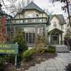 Exterior of the Kelly Writers House with a path to the front door. 