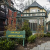 Exterior of the Kelly Writers House with a path to the front door. 