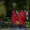 Love Statue and surrounding foliage