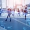 Crowd of pedestrians with data points overlapping over the graphic.