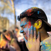 color powder on student's face during holi festival