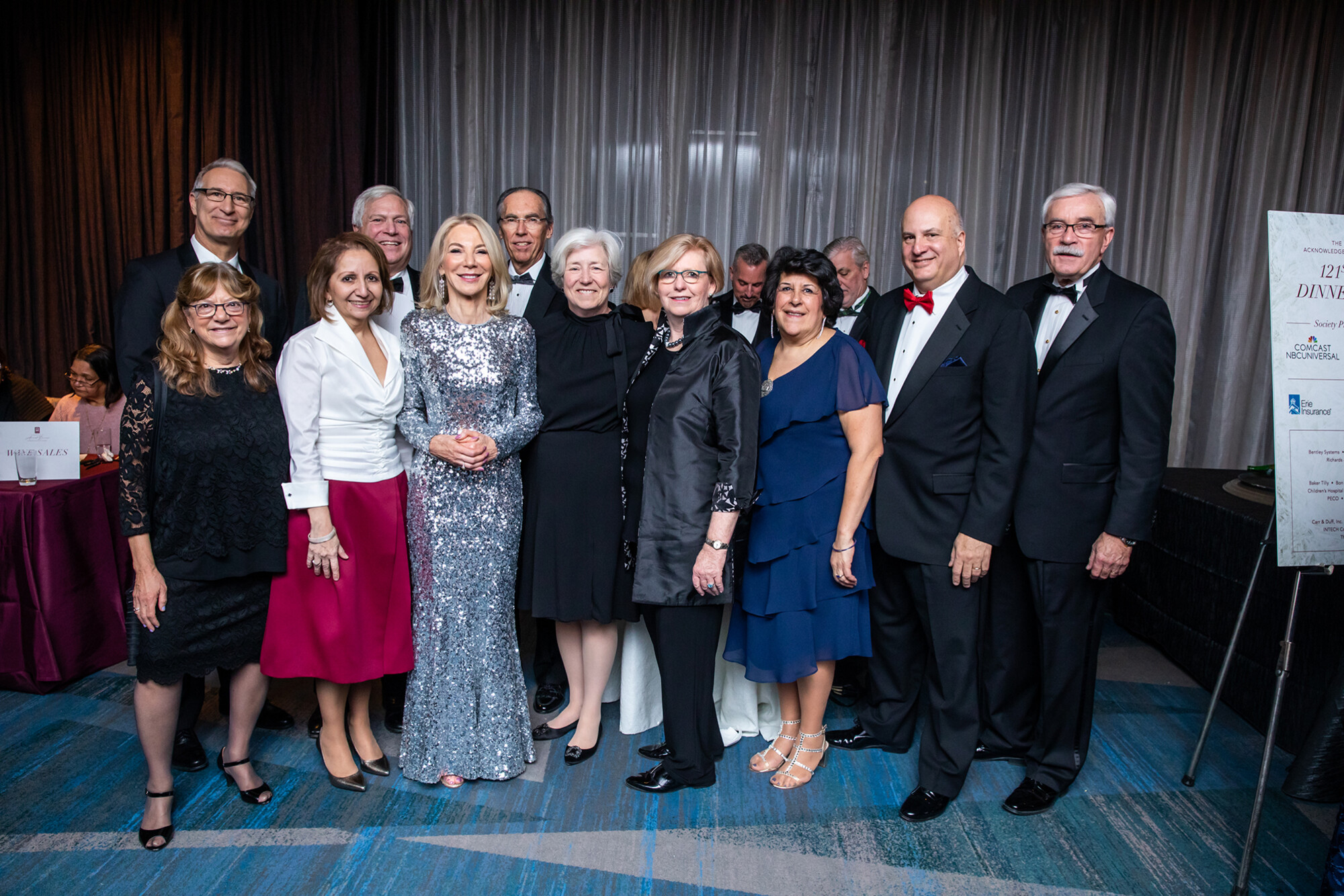 Group photo of Penn President Amy Gutmann and xxxx