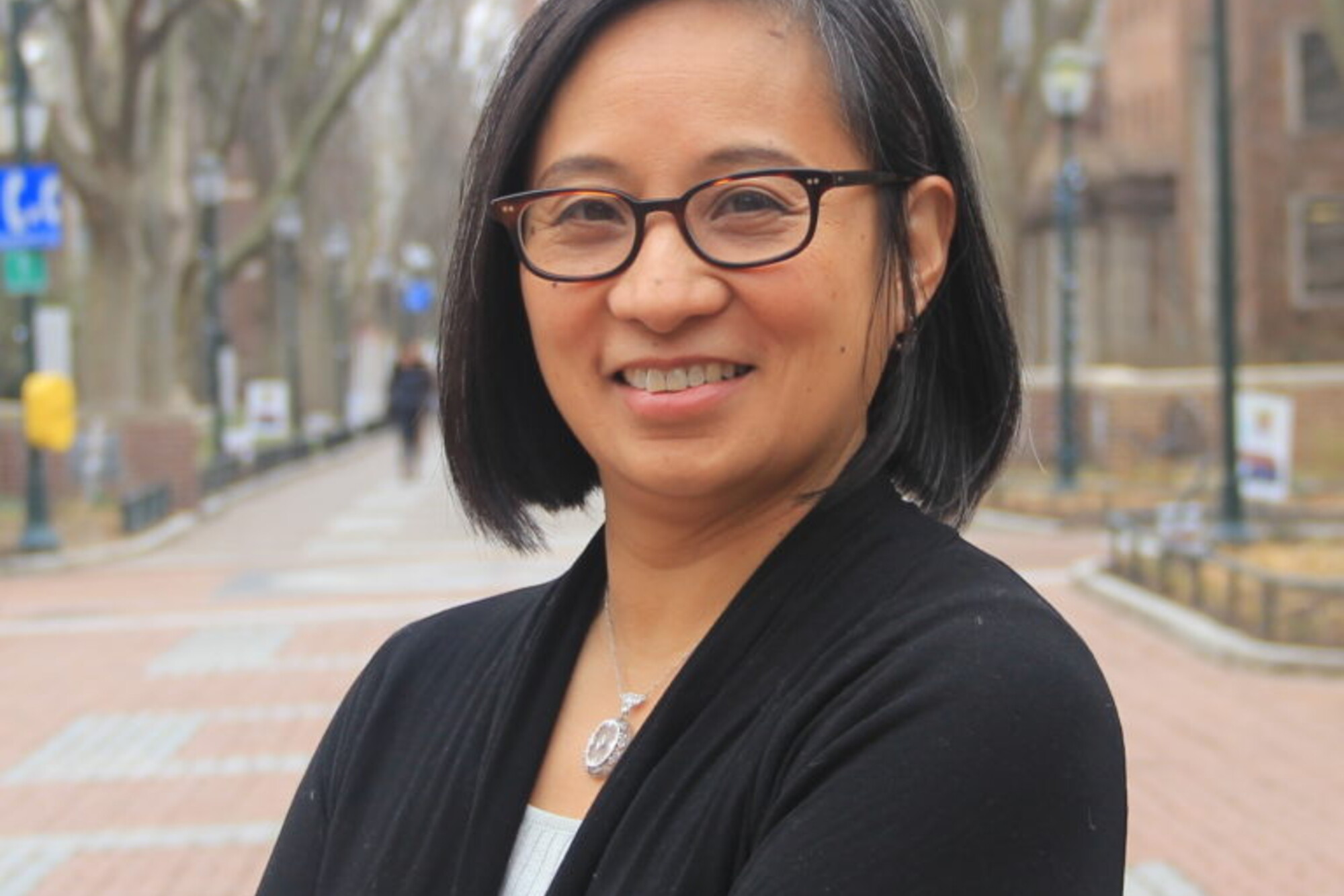 Portrait of a woman with glasses on Locust Walk