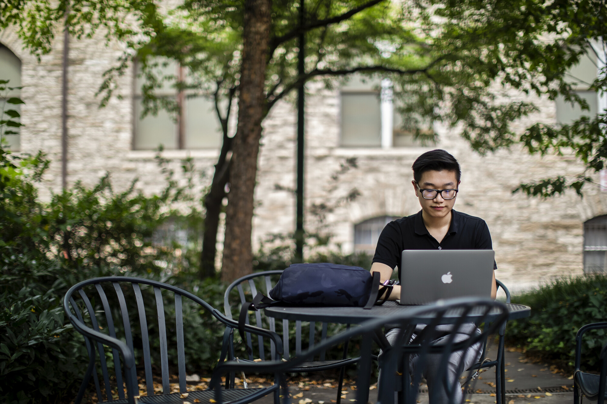 steven chen working on a laptop