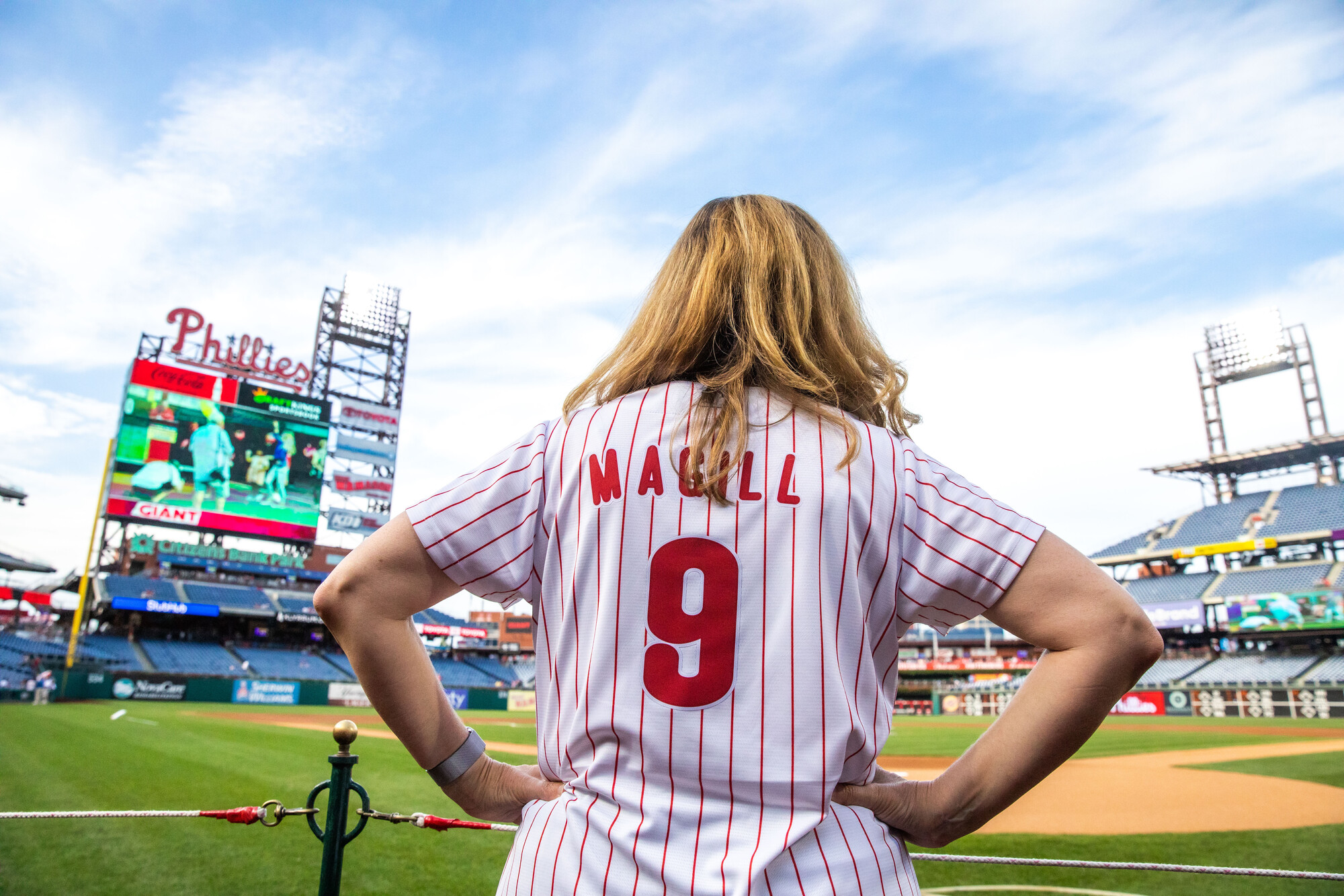 Shot of back of Magill's baseball shirt with "Magill" on it and a number "9"