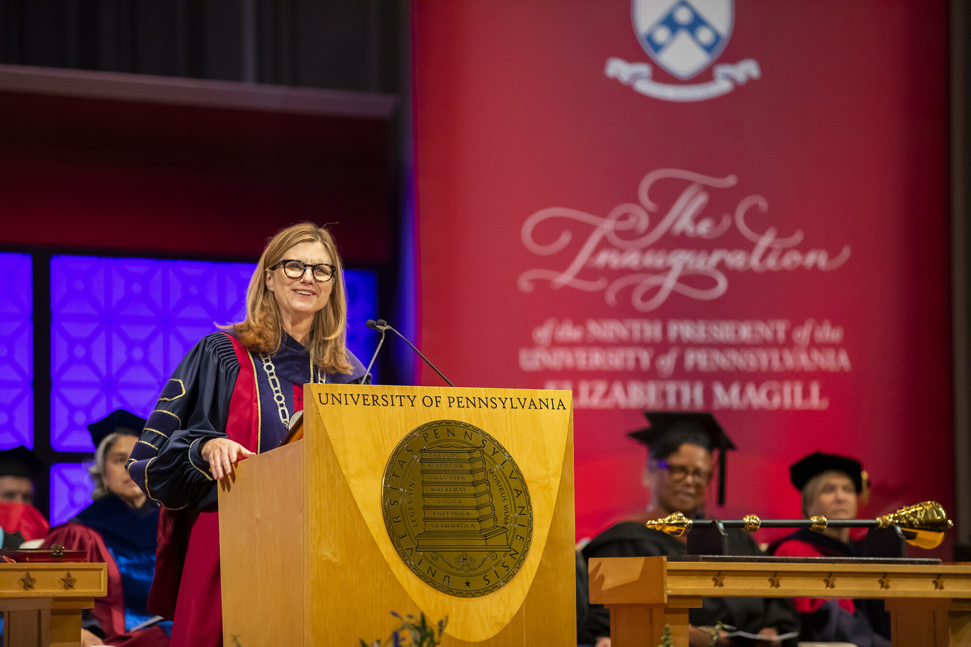 president liz magill speaking at podium
