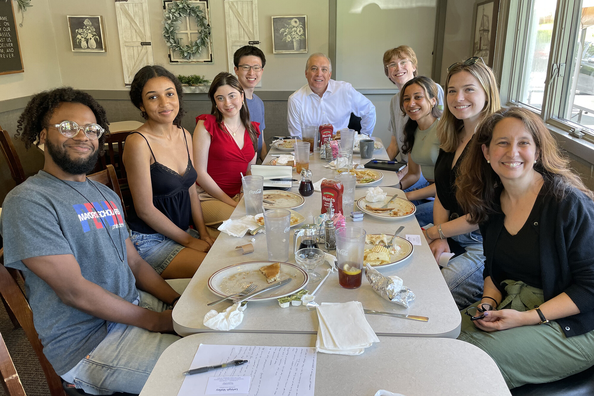 Members of Penn’s Political Empathy Lab at a diner with Don Cunningham in Allentown PA.