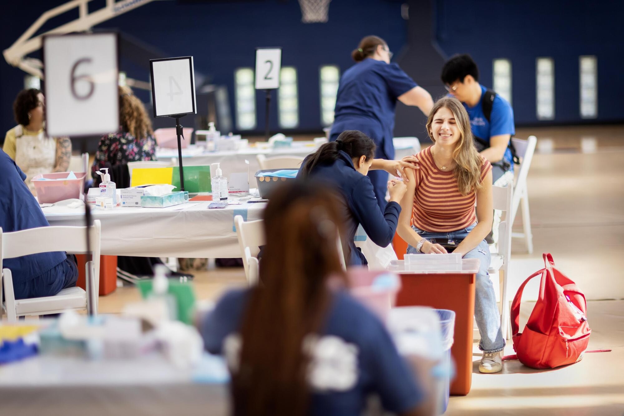 A person receives their flu shot at Penn’s annual flu clinic.