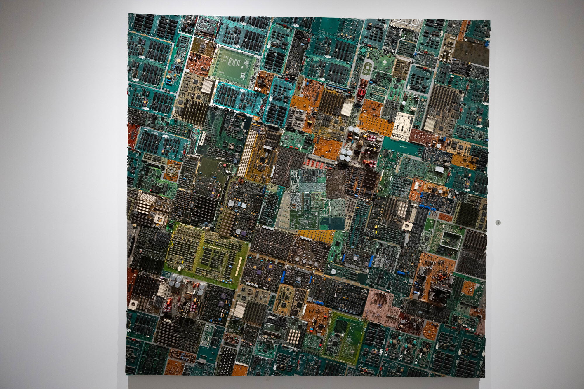 an artwork made of computer components that looks like an arial lanscape